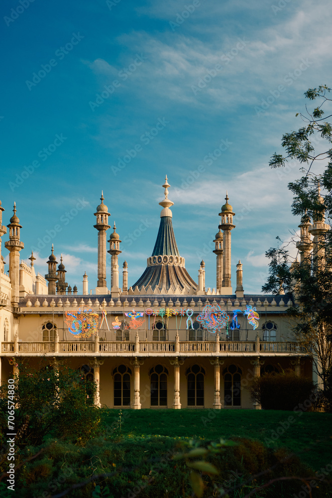 Brighton Pavilion building in seaside town at sunset with blue skies