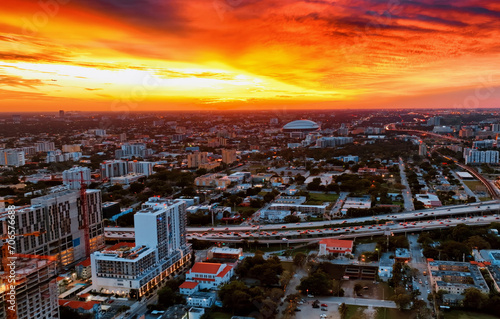 Aerial View of Miami City at Sunset. Capture the stunning beauty of Miami City from above as the sun sets.