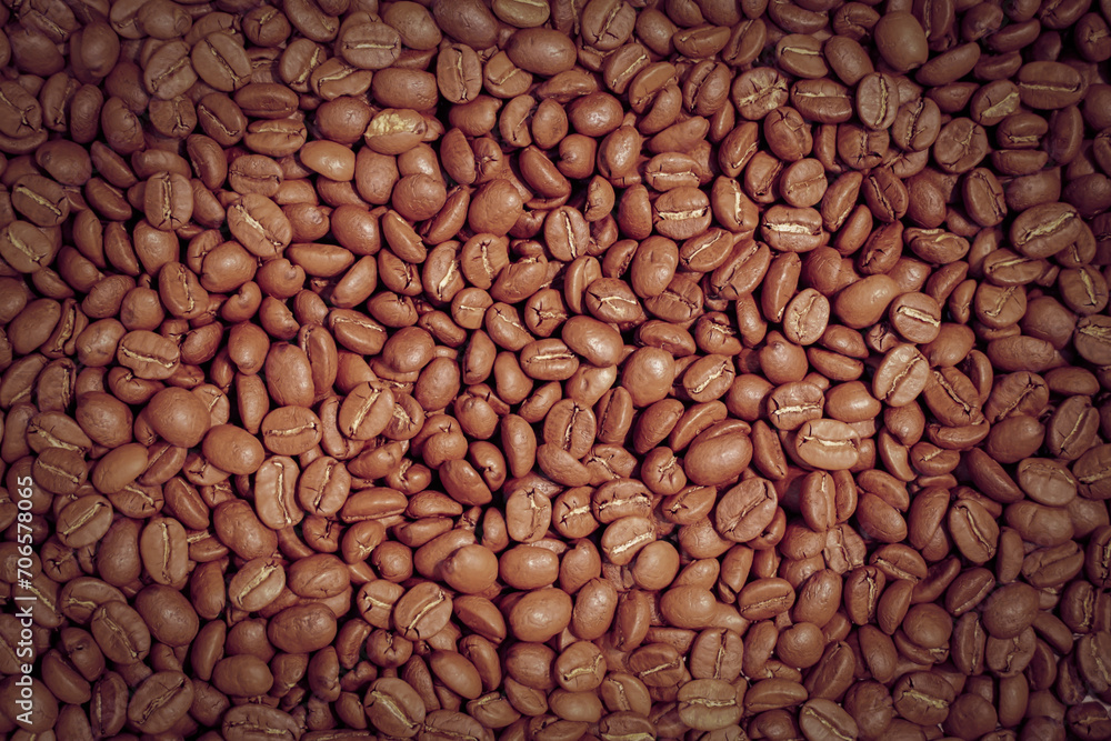 Brown roasted coffee beans, The dried coffee beans, background. Brown roasted coffee beans, The dried coffee beans, background.