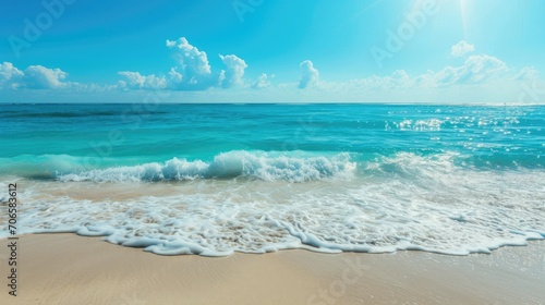 Beautiful sandy beach and soft blue ocean wave, Summer seascape background. © Thanaphon