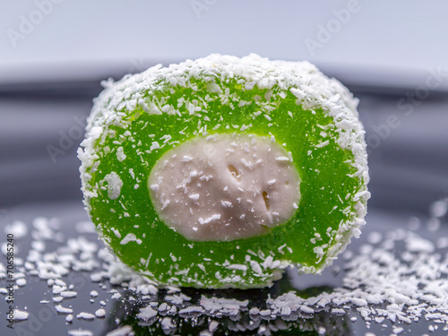 Turkish delight. White and green Lokum with nuts and coconut flakes