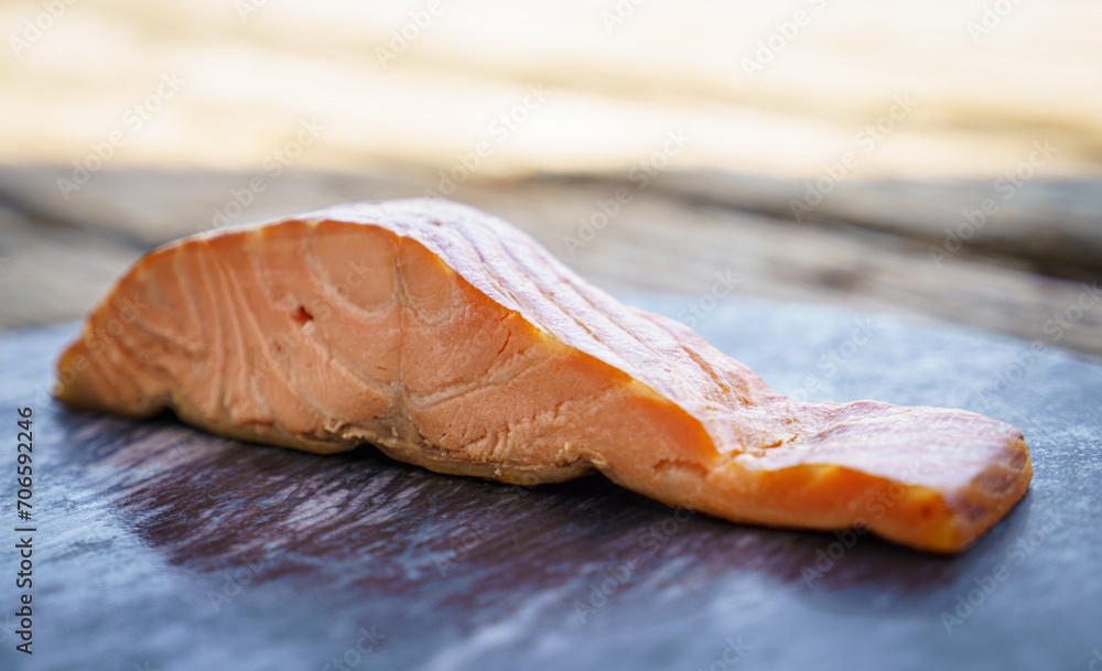 salmon steak on wooden cutting board salmon steak on wooden cutting board