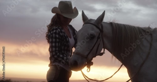 Woman, horse and sunset in countryside or ranch with mockup space and travel. Orange sky, nature and equestrian environment, animal or pet with cow girl outdoor, adventure and horizon with calm