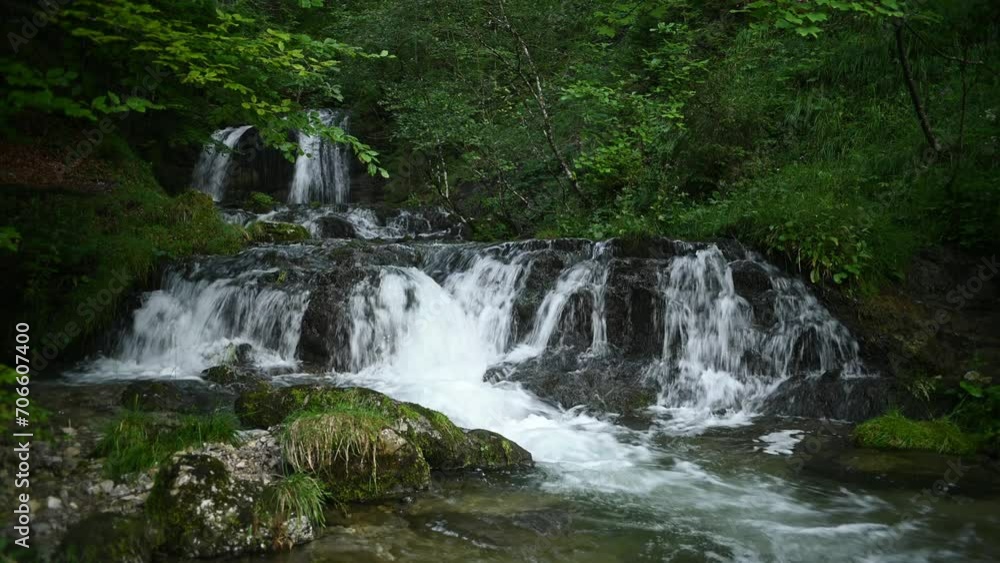 Upper waterfall at Josephsthaler Wasserfälle hidden in the summer forest with a beautiful mountain stream Upper waterfall at Josephsthaler Wasserfälle hidden in the summer forest with a beautiful mountain stream