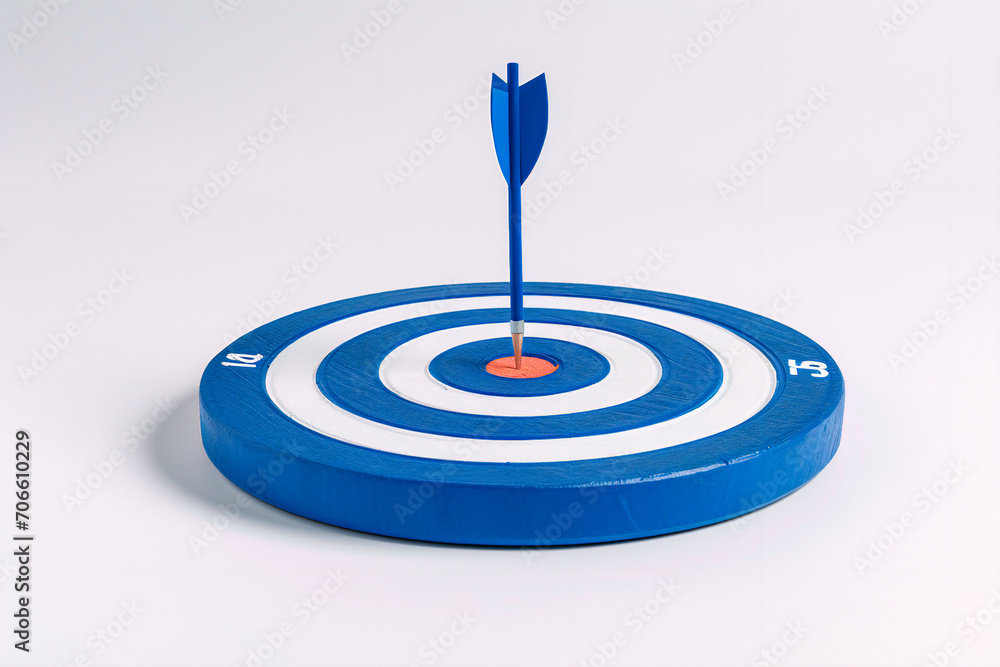 A white background featuring a blue and white target with an arrow at the center.
A white background featuring a blue and white target with an arrow at the center.