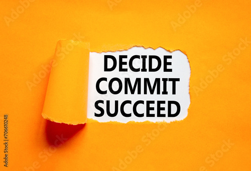 Decide commit succeed symbol. Concept word Decide Commit Succeed on beautiful white paper. Beautiful orange table orange background. Business decide commit succeed concept. Copy space.
