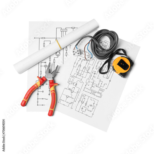 Wiring diagrams, wires, pliers and tape measure isolated on white, top view
