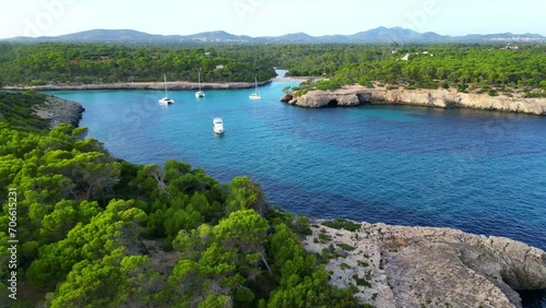 Wallpaper Mural Mallorca, Balearic Islands, Spain. Tropical paradise turquoise bay. Beautiful Mediterranean cave rocky sandy beach with blue water, sunny day in Majorca. Famous tourist attraction Cala Mondrago Beach Torontodigital.ca