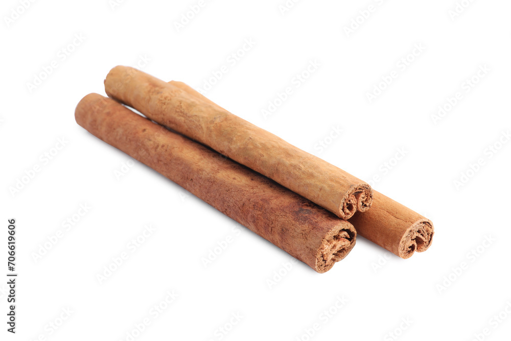 Dry aromatic cinnamon sticks isolated on white Dry aromatic cinnamon sticks isolated on white