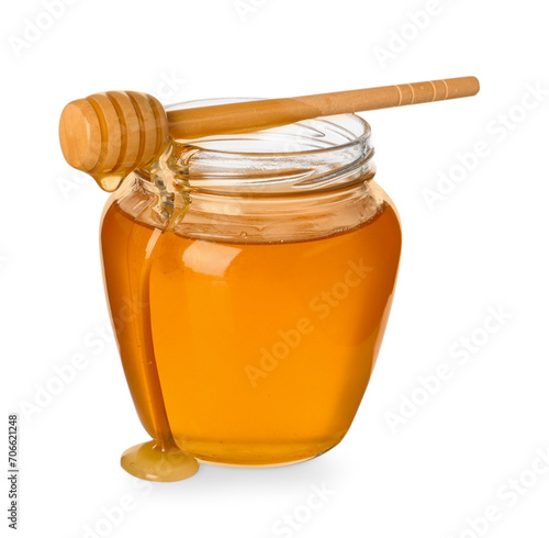 Tasty honey in glass jar and dipper isolated on white