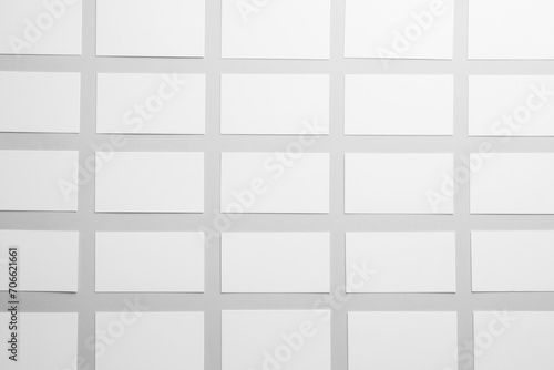 Blank business cards on light gray background  flat lay. Mockup for design