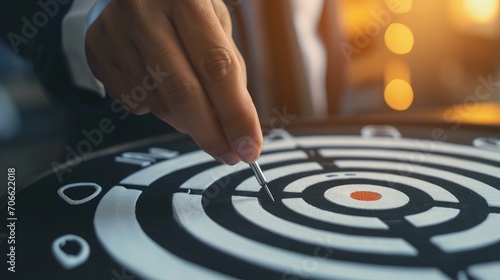 businessman hand touching to target dart board for setup and achievement objectives target for business investment concept. 