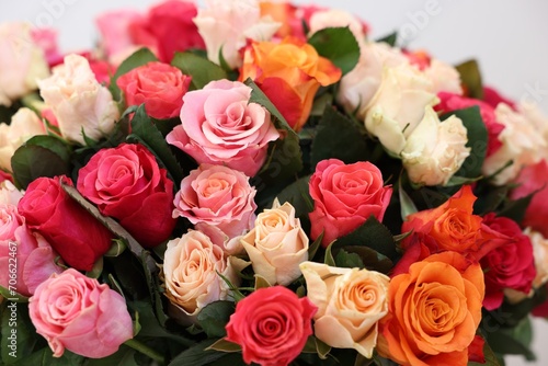 Beautiful bouquet of colorful roses  closeup view