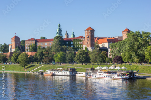 Restaurant ships in the river at the historic Wawel castle in Krakow, Poland