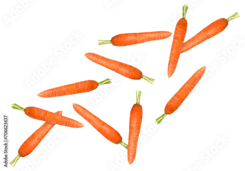 Fresh ripe carrots falling on white background