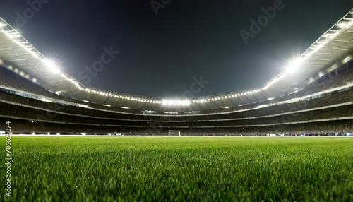 football soccer match grass close up night event lights on the stadium © Irene