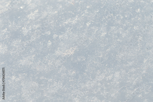 White snow texture macro. Winter background. Snowflakes