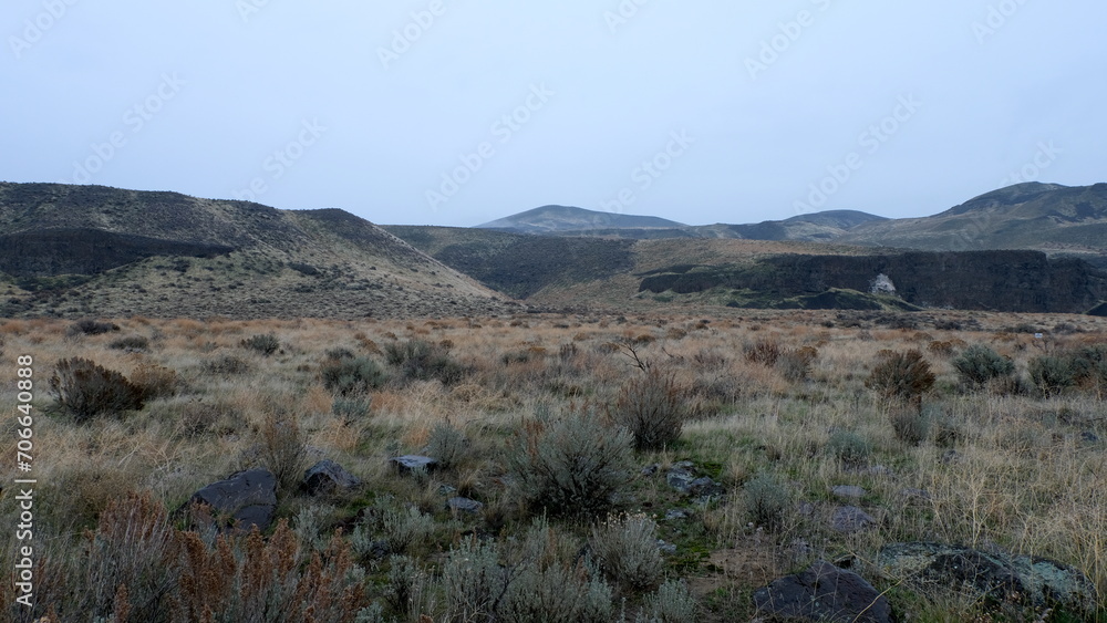Scenic panoramic view of mountainous landscape at Frenchman Coulee on a crisp, cold wintery fall day in Washington state, USA