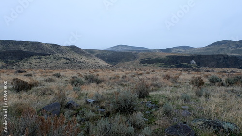 Scenic panoramic view of mountainous landscape at Frenchman Coulee on a crisp, cold wintery fall day in Washington state, USA