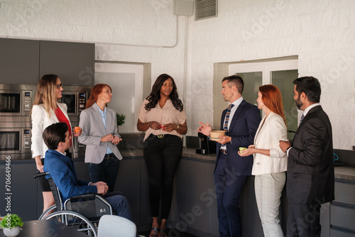 Meeting in the break room of a company's businessmen while they have coffee. Concept: business, investment