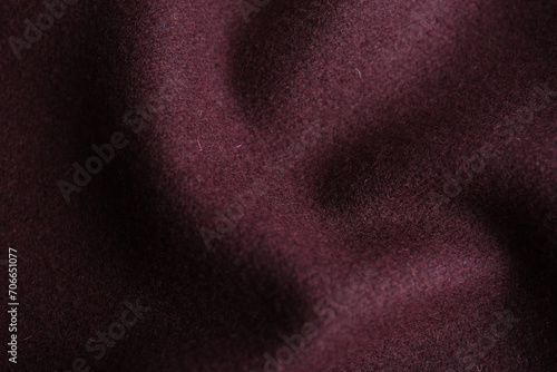 Texture of beautiful dark red fabric as background, closeup