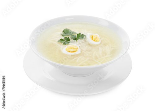 Tasty soup with noodles, egg and parsley in bowl isolated on white