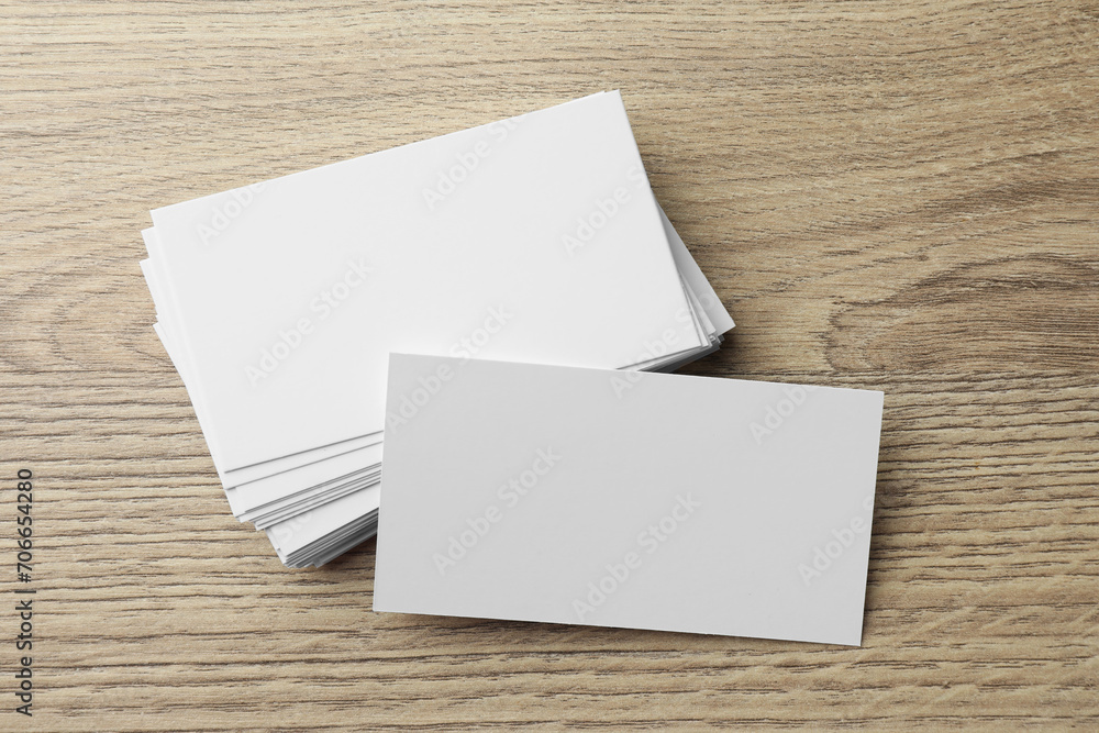 Blank business cards on wooden table. Mockup for design Blank business cards on wooden table. Mockup for design
