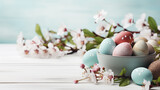 Easter eggs and flowers on blue wooden background 