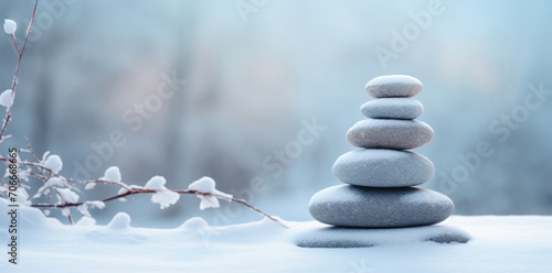Stones lying in the shape of a pyramid, zen in winter.