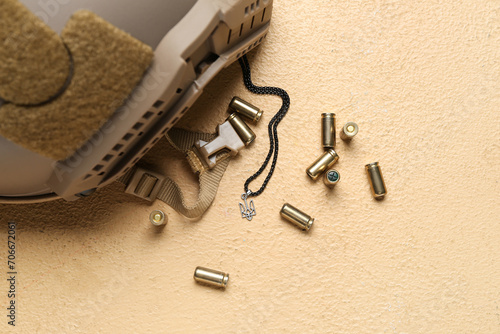 Military helmet, bullets an...