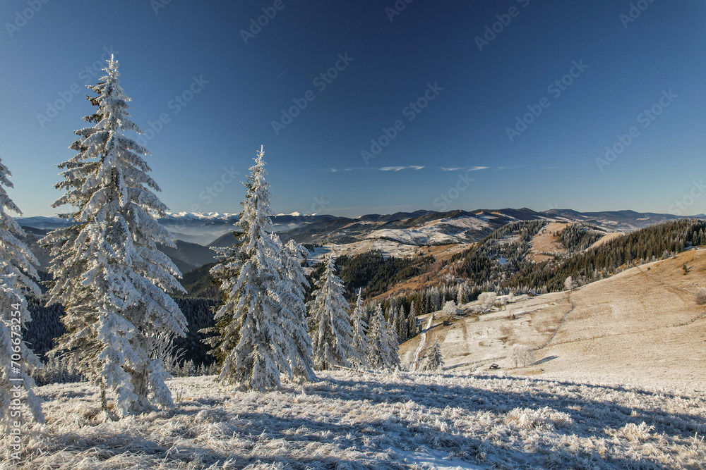 Snow-covered Carpathian mountains, sunny weather on the top of Mount Pysany Kamin. Ukraine Snow-covered Carpathian mountains, sunny weather on the top of Mount Pysany Kamin. Ukraine