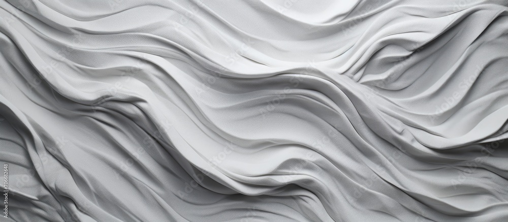Artistic adornment of grey and white recycled paper with a wrinkled, shiny texture. Artistic adornment of grey and white recycled paper with a wrinkled, shiny texture.