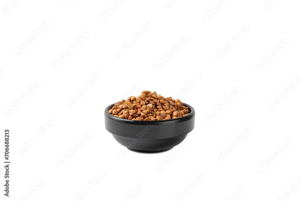Raw buckwheat in a bowl isolated on a white background. Wheat grains, porridge, cereals, raw buckwheat in a plate. Healthy food. Porridge. Diet. Organic cerea Raw buckwheat in a bowl isolated on a white background. Wheat grains, porridge, cereals, raw buckwheat in a plate. Healthy food. Porridge. Diet. Organic cerea