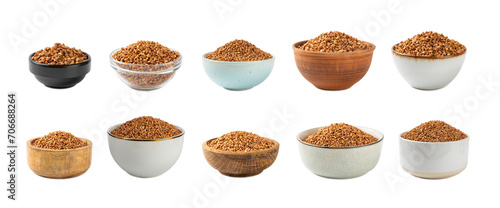 Raw buckwheat in a bowl isolated on a white background. Wheat grains, porridge, cereals, raw buckwheat in a plate. Healthy food. Porridge. Diet. Organic cerea