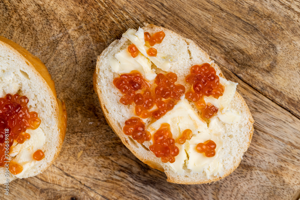 fresh baguette with butter and salmon caviar fresh baguette with butter and salmon caviar