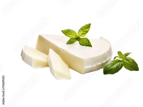 a piece of cheese with basil leaves