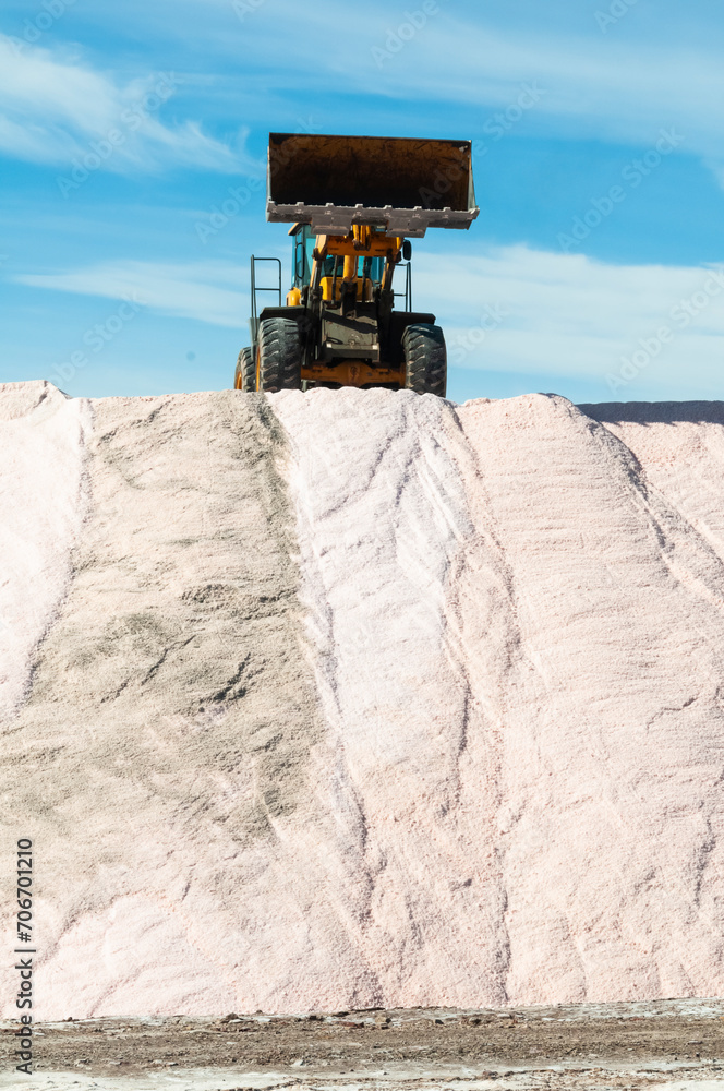 Trucks unloading raw salt bulk, Salinas Grandes de Hidalgo, La Pampa, Argentina.