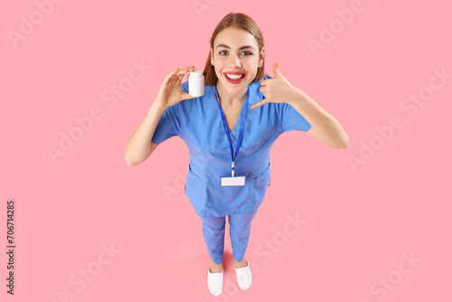 Female doctor with pill bot...
