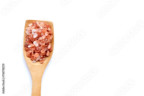 Pink himalayan salt on white.