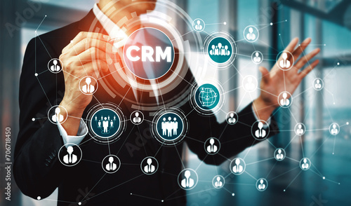 CRM Customer Relationship Management for business sales marketing system concept presented in futuristic graphic interface of service application to support CRM database analysis. uds photo