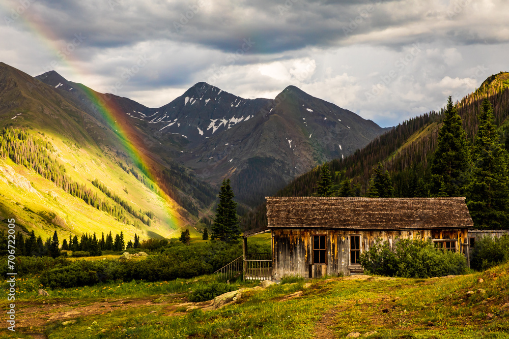 Mountain Rainbow and Cabin in the Rocky Mountains of Colorado