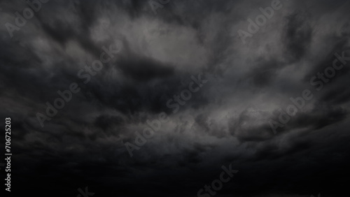 dark dramatic sky with stormy clouds before rain or snow as abstract background, extreme weather