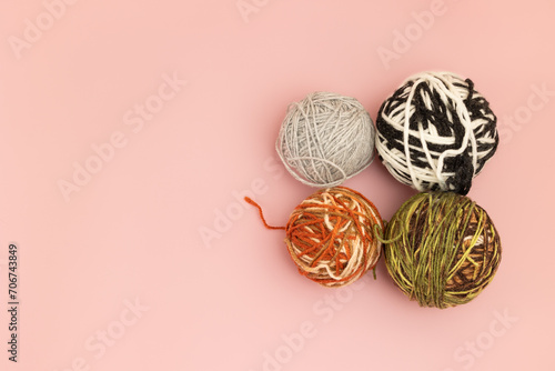 Balls of knitting threads on the table