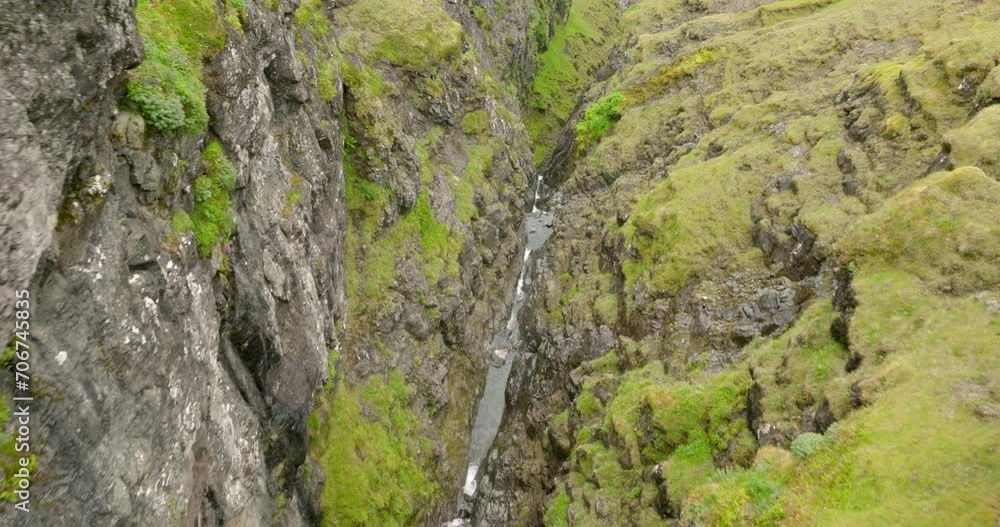 Aerial: Drone Forward Tilt Up Scenic Shot Of Green Cliff By Sea - Langasandur, Faroe Islands Aerial: Drone Forward Tilt Up Scenic Shot Of Green Cliff By Sea - Langasandur, Faroe Islands