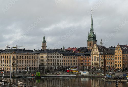 View of a cityscape against cloudy sky