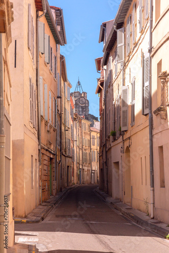 Sunny street and church in Avignon  southern France