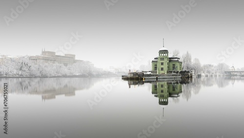 Snowfall and fog at the Helmovsky Jez hydroelectric power plant power station in Prague, Czech Republic, Europe photo