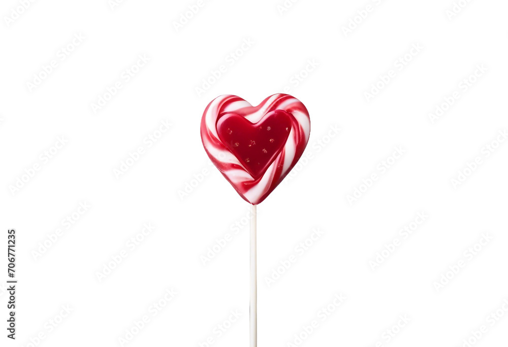 Heart shaped candy on a stick on gray background with copy space Valentines Day celebration