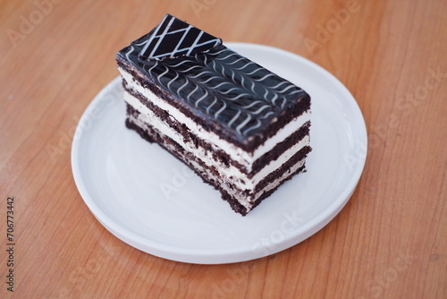 Delicious chocolate cake on a white plate