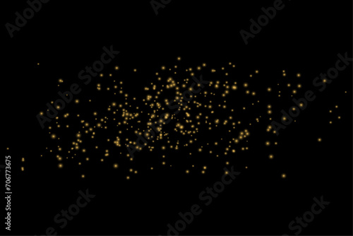 Golden particles glow with many lights. many gold particles on a black transparent background